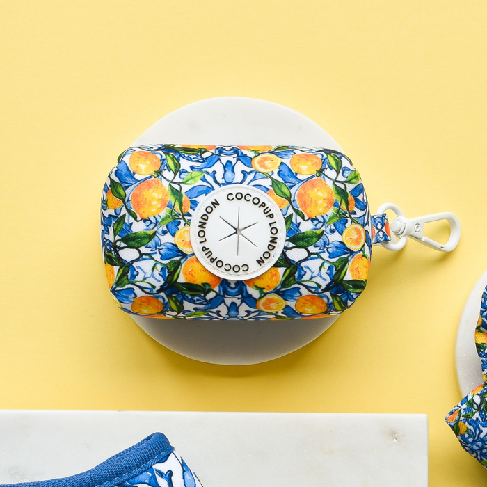 Cocopup London Amalfi Lemon poop bag holder with a bright citrus and floral pattern on a fabric pouch.