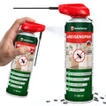 Hand sprüht mit der grün-roten 500-ml-Dose, daneben eine zweite Dose mit ausgeklapptem Sprührohr, davor krabbelnde Ameisen