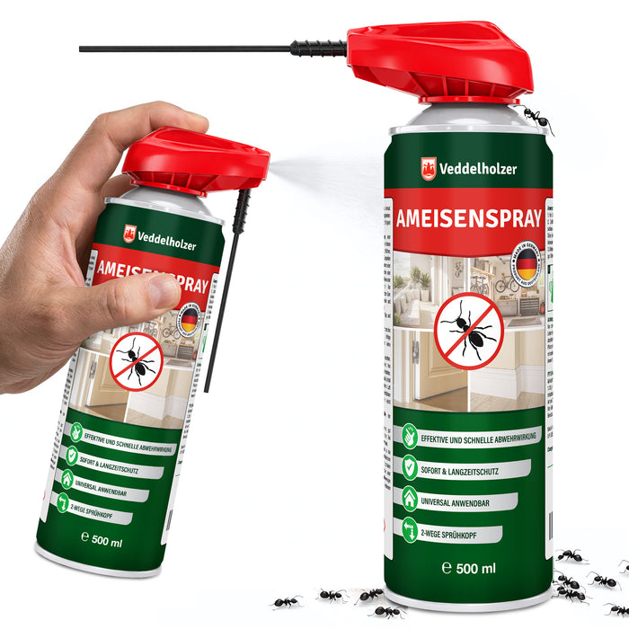 Hand sprüht mit der grün-roten 500-ml-Dose, daneben eine zweite Dose mit ausgeklapptem Sprührohr, davor krabbelnde Ameisen