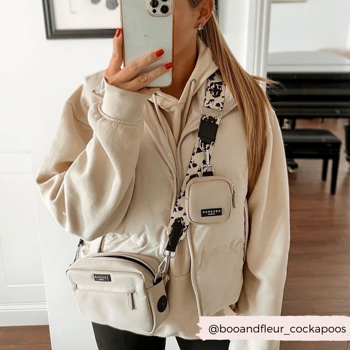 girl-wearing-ivory-tort-bag-strap-with-caramel-bag-and-treat-pouch