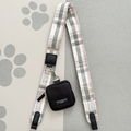 Oxford plaid Cocopup London bag strap with black pouch on a grey surface with white paw prints.