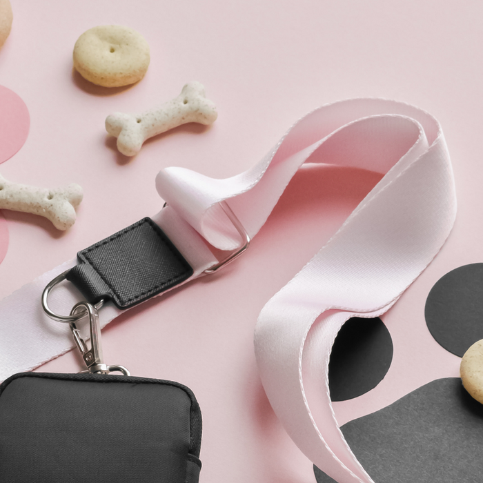 The Bag Strap - Plain Baby Pink from Cocopup London is the perfect blend of style and function. This charming pink strap pairs effortlessly with your Cocopup Dog Walking Bag, making it an essential accessory for carrying everyday essentials.