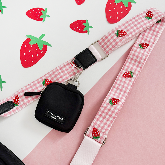Pink gingham bag strap with strawberry print, designed for Cocopup London dog walking bags.