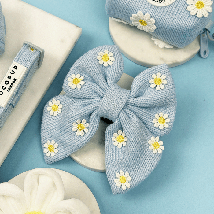 Blue dog Sailor Bow Tie with white flower decals.