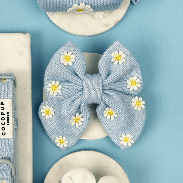 Blue dog Sailor Bow Tie with white flower decals.