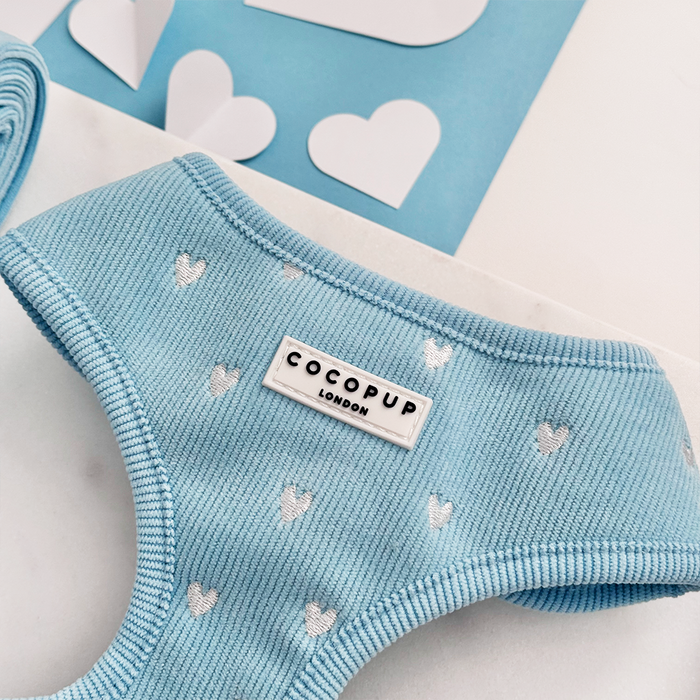 Blue Heartstrings cord adjustable neck harness by Cocopup London on a split blue and white background.