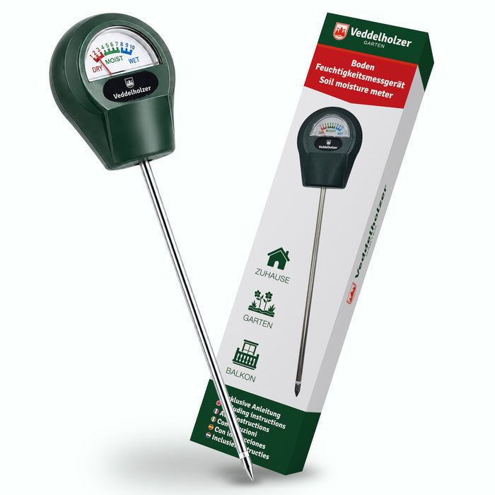 Dunkelgrünes Messgerät mit Skala „Dry – Moist – Wet“ und langer Edelstahlsonde neben der Verpackung mit Icons Zuhause, Garten, Balkon