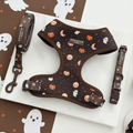 Brown dog harness, lead and collar with cute Halloween print featuring pumpkins, ghosts, and moons.