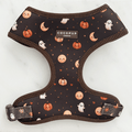 Brown dog harness with cute Halloween print featuring pumpkins, ghosts, and moons.