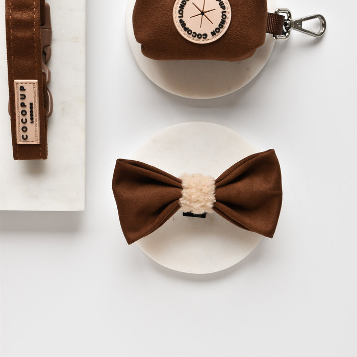 Brown aviator-style dog bow tie with a beige center and brown accents.
