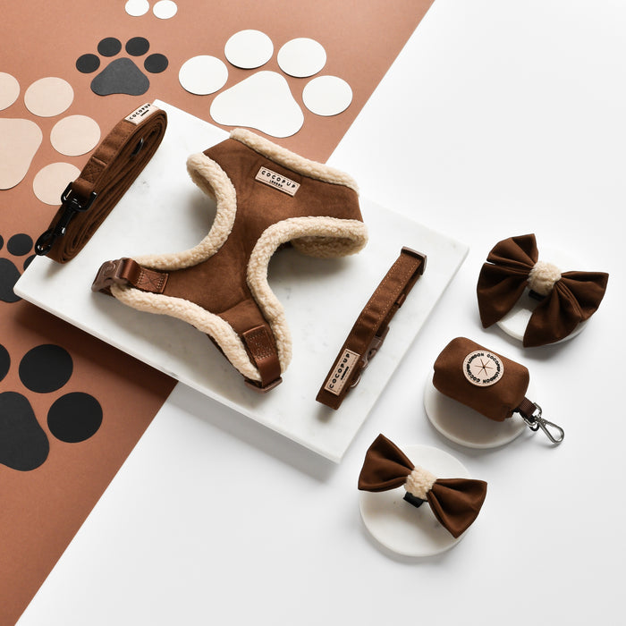 Brown faux suede and sherpa dog set with bow tie, leash, collar, and poop bag holder from Cocopup London.