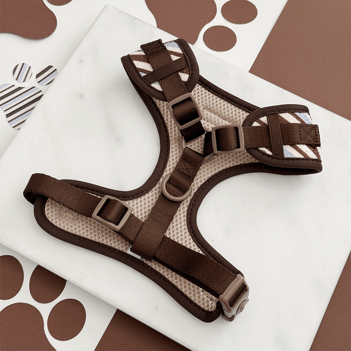 Brown, blue and white striped Dog Harness, showing the reverse side with D Ring and adjustable straps.