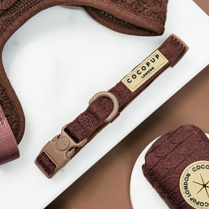 Brown cable knit dog collar with Cocopup London logo and matching accessories on a white background.