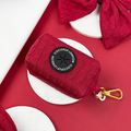Mulled wine cable knit poop bag holder with gold clasp and Cocopup London logo.