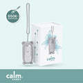 Grey CalmCarry device with packaging on a light blue background