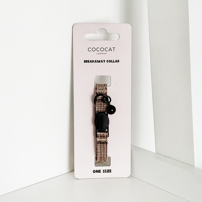 Plaid Cocopup London cat collar with breakaway buckle and black bell on white packaging, set against a white background.