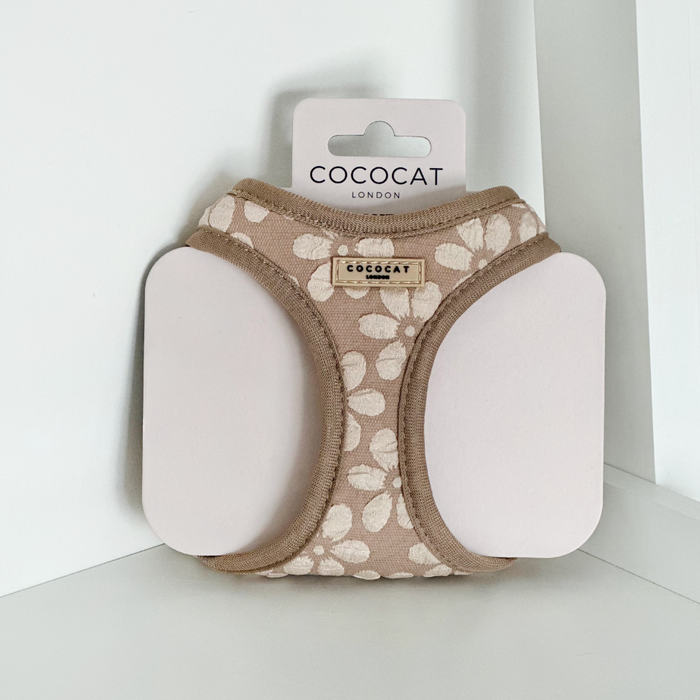 Beige cat harness with white floral print, displayed on a branded Cocopup London packaging card.