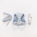 Cat harness, lead, and collar set with small yellow lemons on light blue striped fabric.