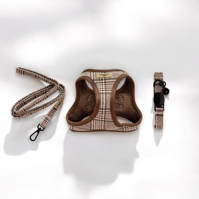 Cocopup London plaid cat harness, lead, and collar set in neutral tones on a white surface with soft shadows.