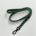 Khaki leopard print cat lead by Cocopup London with black metal clip and label on a white background.