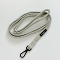 Sage tweed cat lead with black clasp from Cocopup London on a white background.