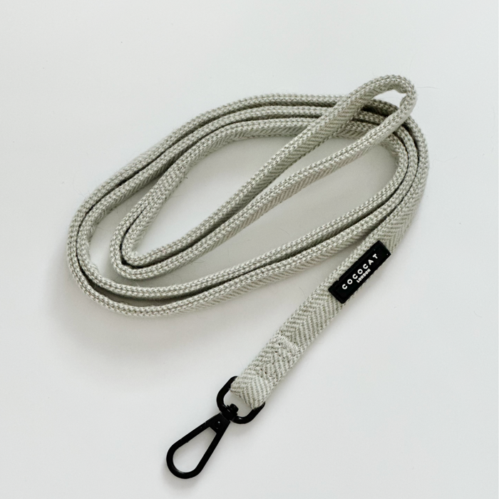Sage tweed cat lead with black clasp from Cocopup London on a white background.