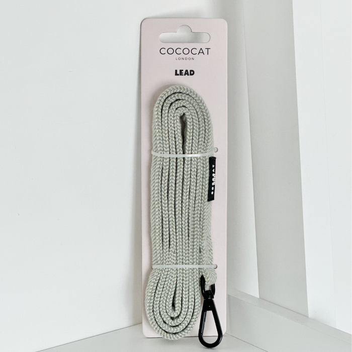 Cocopup London Cat Lead in sage tweed with black clasp, packaged on a white background.