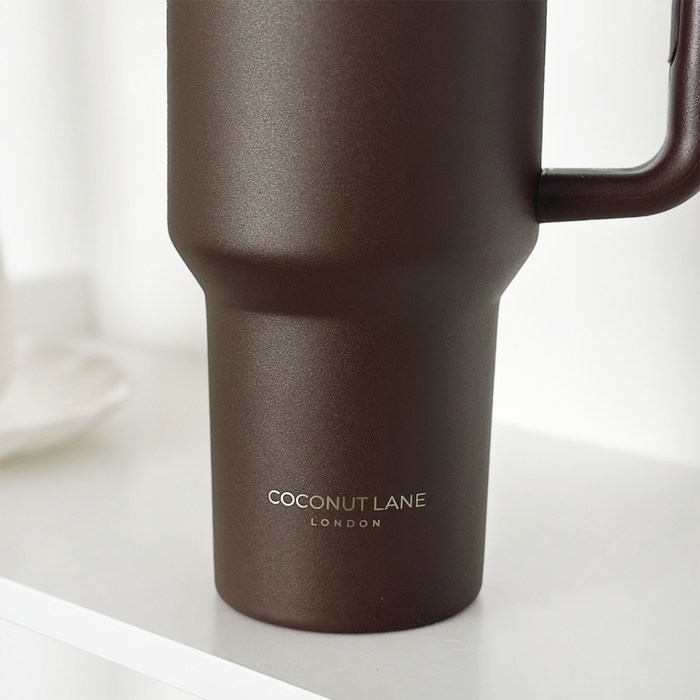 Matte brown stainless steel tumbler with Cocopup London branding on a white surface.