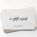 White Cocopup London E-Gift Card with COCOPUP LONDON text printed in bold lettering.