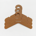 Three Cocopup London Harness Hanger packs, neatly stacked, with white packaging on a plain white background.