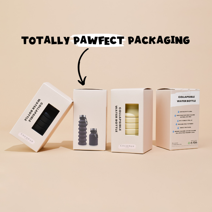Four nude Cocopup London collapsible water bottle boxes standing upright with TOTALLY PAWFECT PACKAGING above.