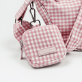 Pink and white gingham check design treat pouch for dog treats.
