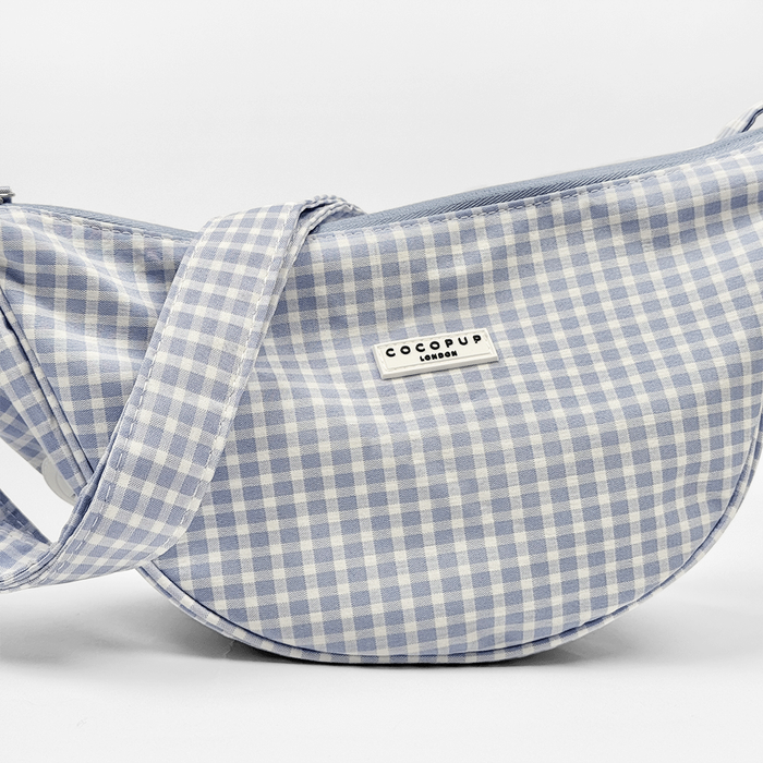 Blue and white gingham check print bag with matching strap.