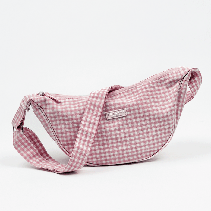 Pink and white gingham check design bag with matching strap.