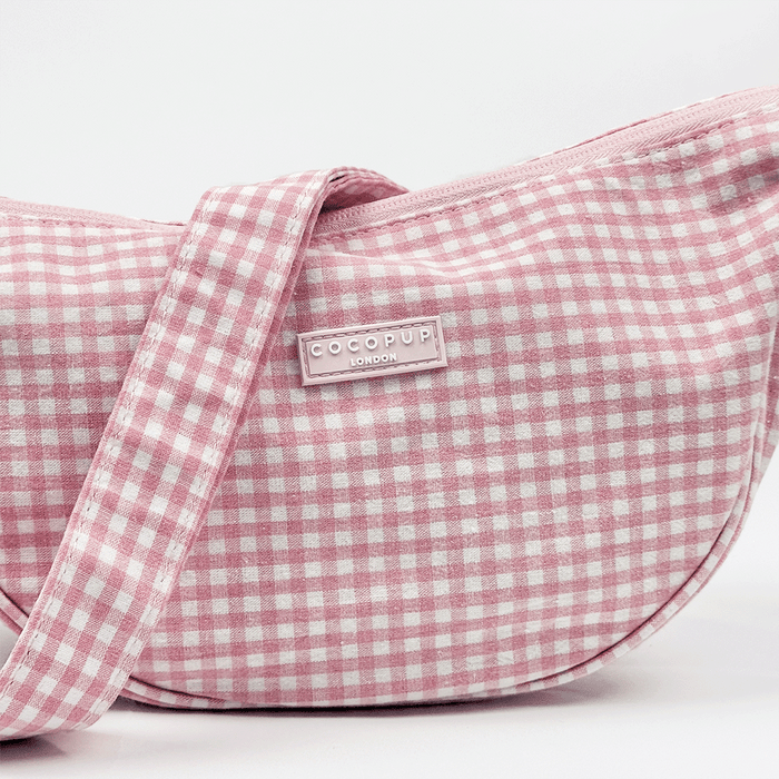 Pink and white gingham check design bag with matching strap.