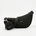 Black Cocopup London crescent crossbody dog walking bag with matching pouch.