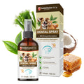 Braune Sprühflasche Dental Spray 150 ml neben der Faltschachtel, umgeben von Fenchel, Grünteeblättern, Kokosnuss und Honigwabe
