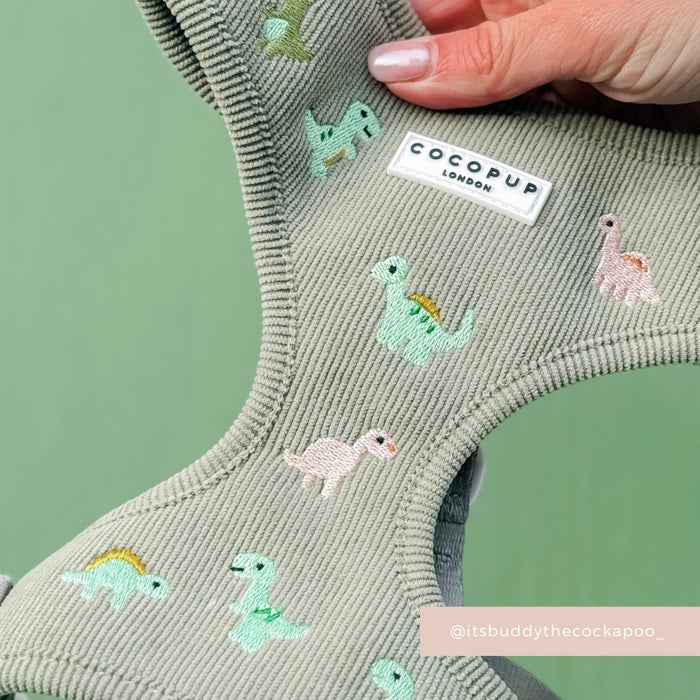 Cocopup London adjustable harness with a colorful dinosaur pattern, shown in close-up.