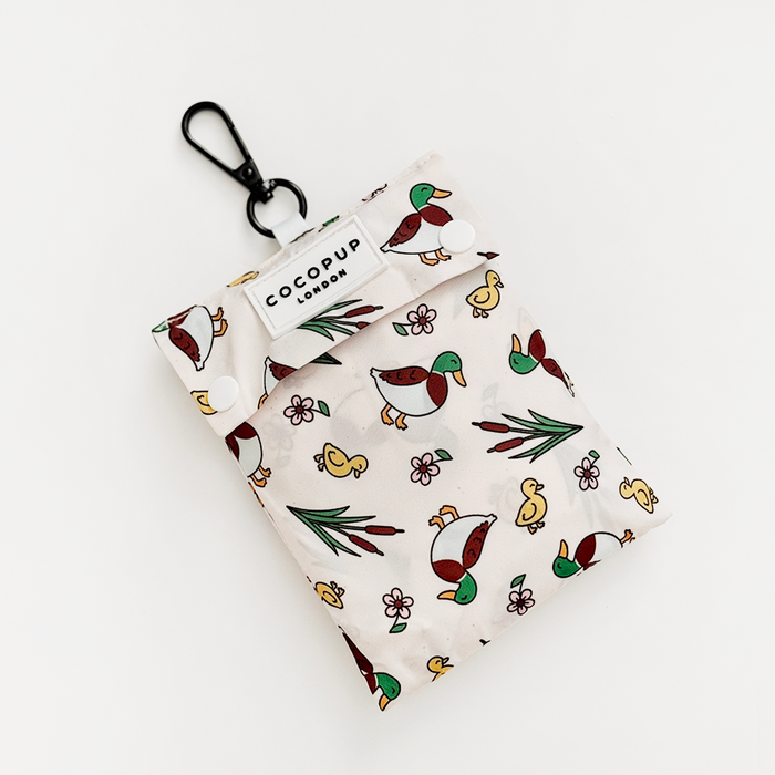 Duck-patterned pouch with a black clip and white snap closure.