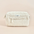Vanilla textured tweed dog walking bag with front pocket, displayed on a neutral background.