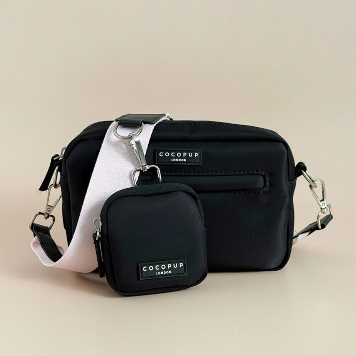 Baby pink Cocopup London dog walking bag and matching treat pouch, both with COCOPUP LONDON labels.