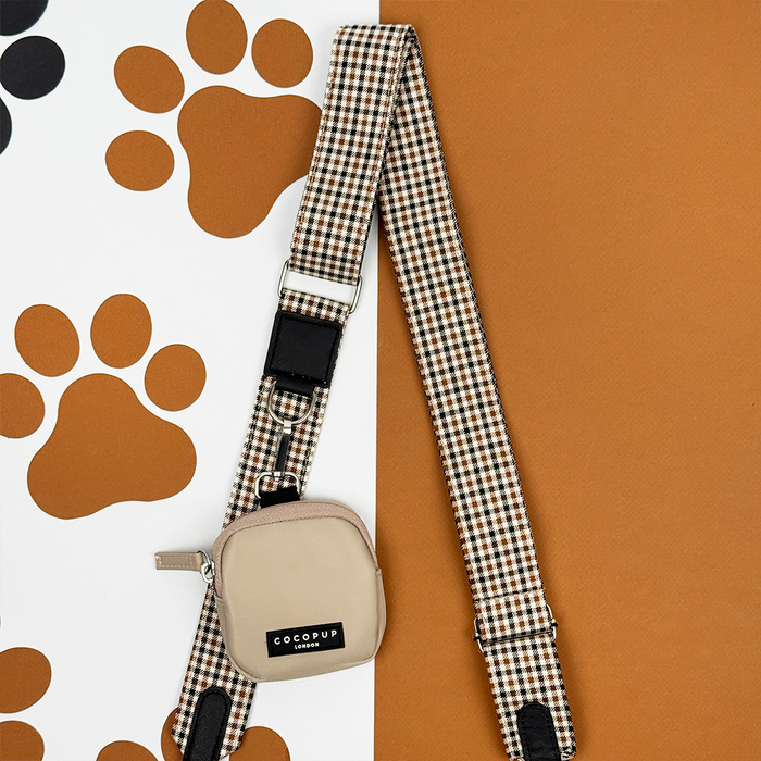 Cocopup London Dog Walking Bag Bundle with checkered strap, beige treat pouch, and brown bag with paw print pattern.