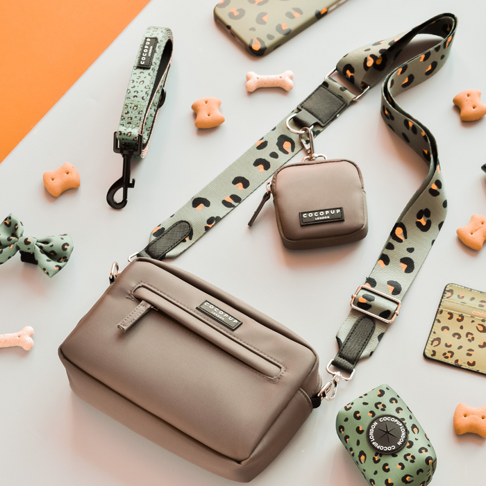 Khaki leopard print dog walking bag set with treat pouch, poop bag dispenser, and matching bow tie.