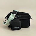 Two Cocopup London dog walking bags in matcha green textured tweed, both with zip closures and compact design.