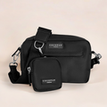 Black dog walking bag bundle by Cocopup London with detachable treat pouch on a neutral background.
