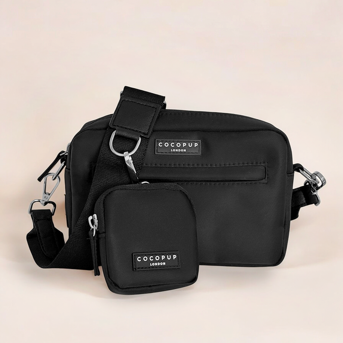 Black dog walking bag bundle by Cocopup London with detachable treat pouch on a neutral background.