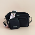 Princess Dino print dog walking bag bundle by Cocopup London with treat pouch and poop bag dispenser, on a beige background.