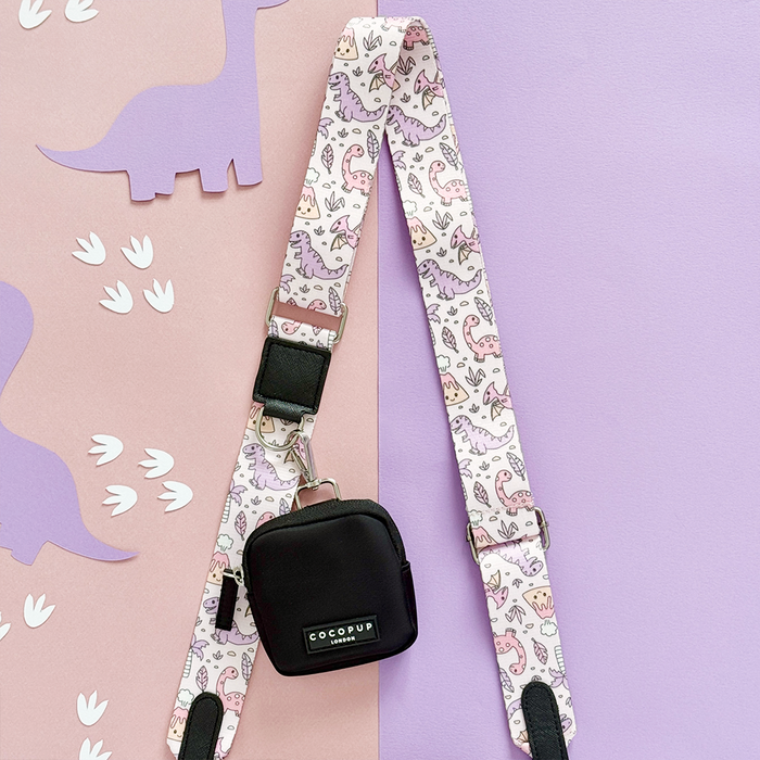 Cocopup London dog walking bag bundle in Princess Dino design with a green dino-print strap, on a pastel background.