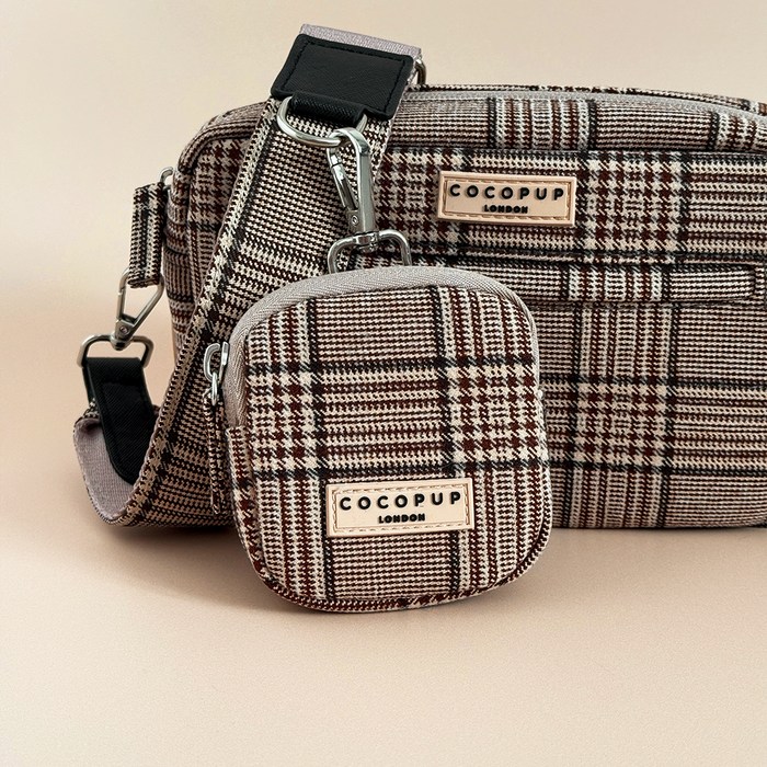 Pup Plaid dog walking bag bundle by Cocopup London in beige plaid pattern with branded labels on a beige background.