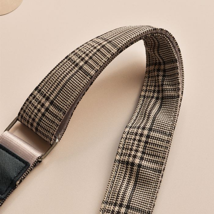 Cocopup London dog walking bag in Pup Plaid with metal buckle, shown close-up.